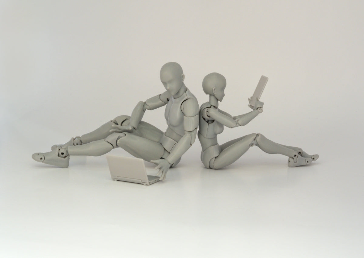 two robot plastic toys holding pistol