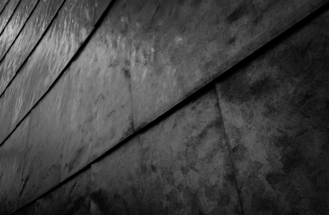 black coated wire on gray concrete floor