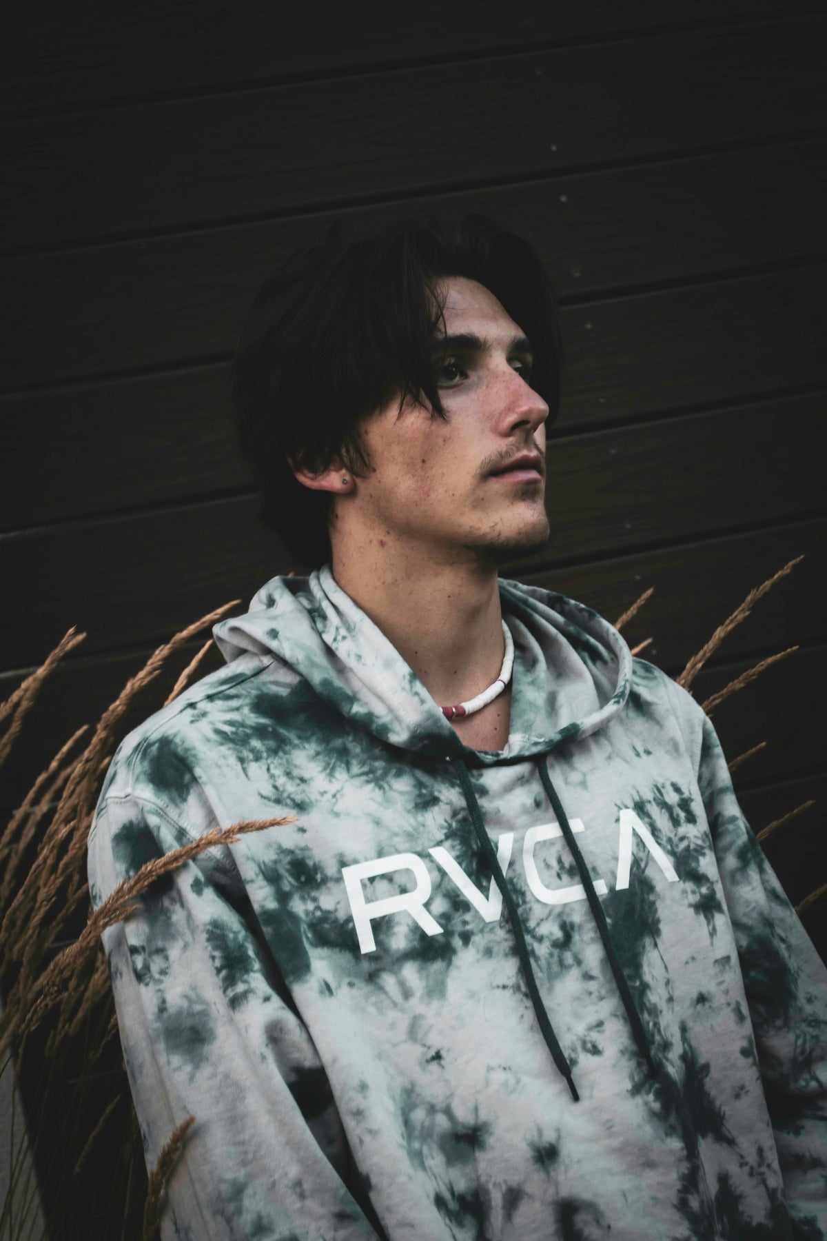 man in gray and white zip up hoodie