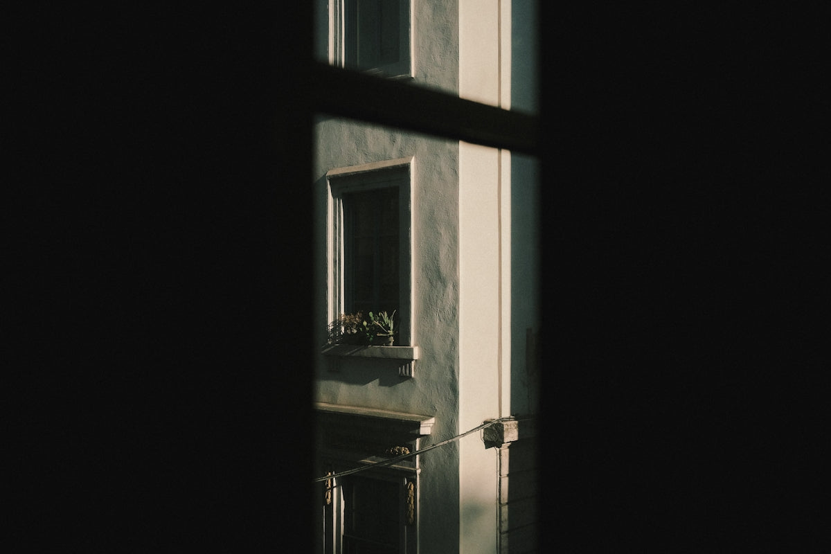 white wooden framed glass window