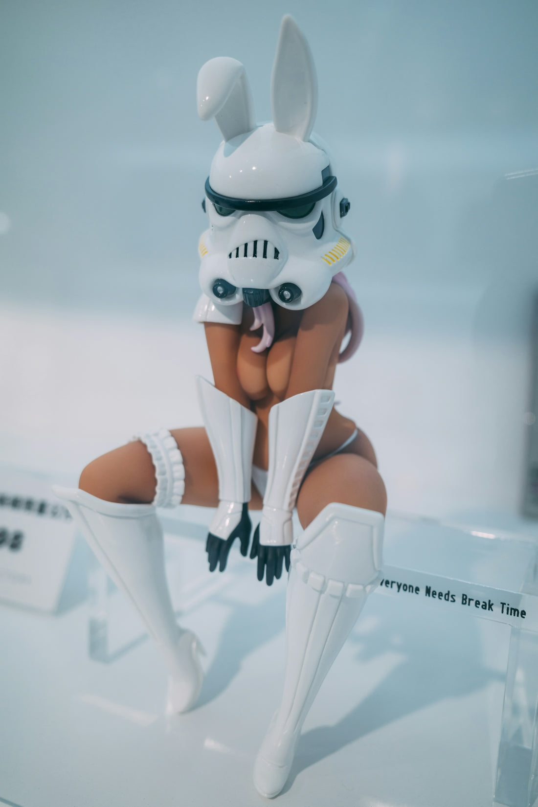 white haired woman in white and black shorts action figure