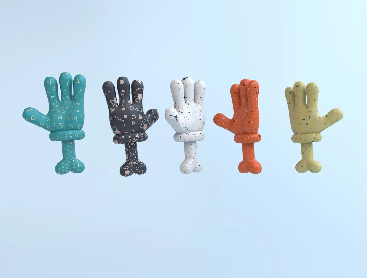 Fem färgglada, tecknad-inspirerade handformade figurer mot ljusblå bakgrund, Nerdbutiken prylar.