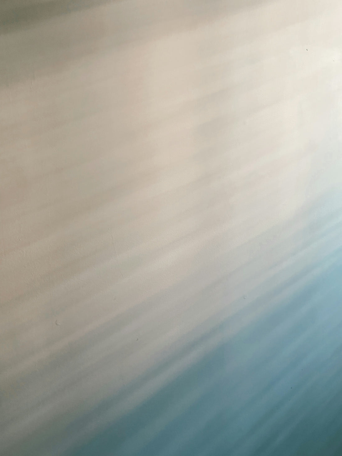 a man riding a snowboard down a snow covered slope