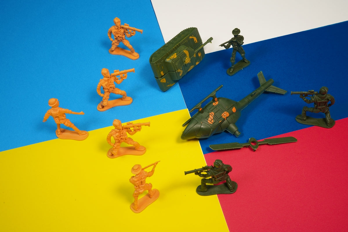 a group of toy army men standing next to each other