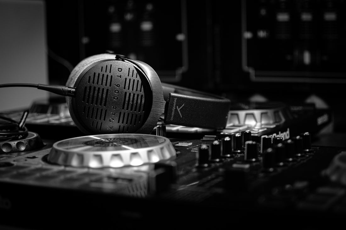 a black and white photo of a mixing board