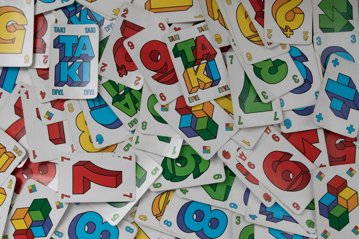 a pile of stickers with numbers and letters on them