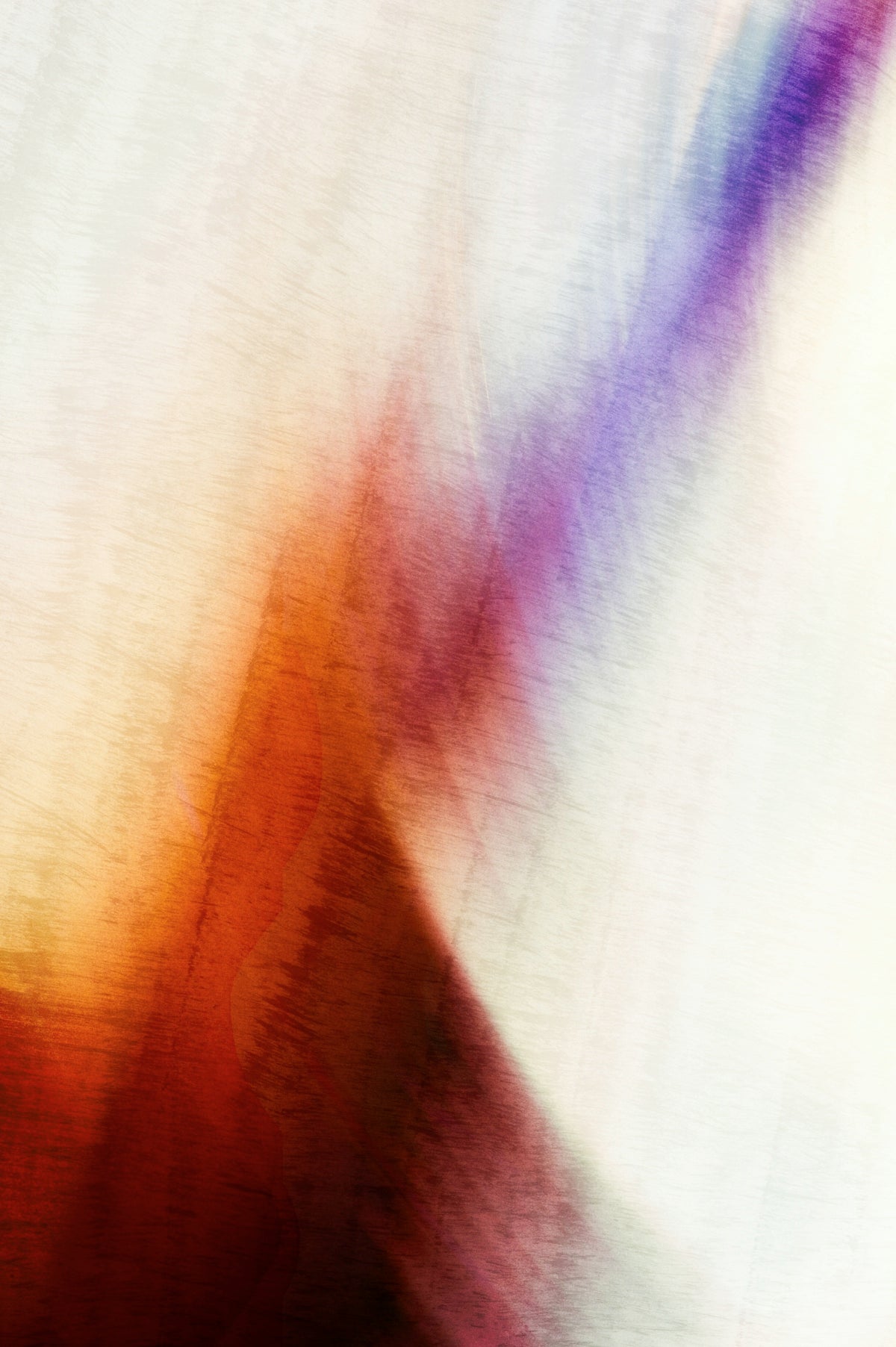 A blurry image of a vase with a flower in it