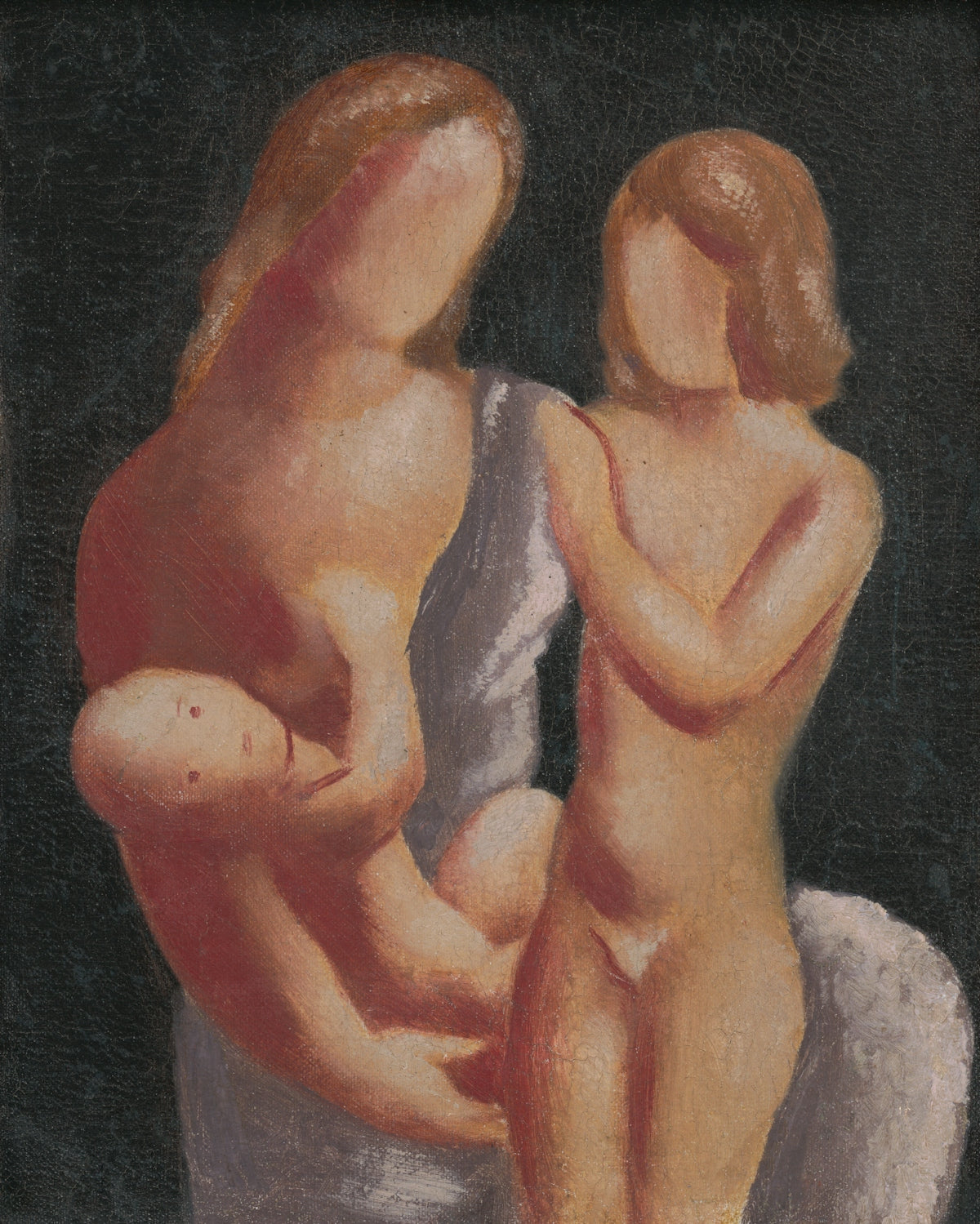 Mother holding a baby with another child nearby